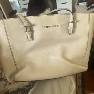 Light grey Michael Kors bag with plenty of room!